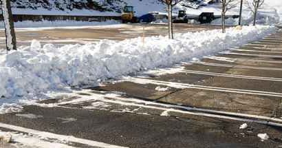 snow and ice removal in a parking lot